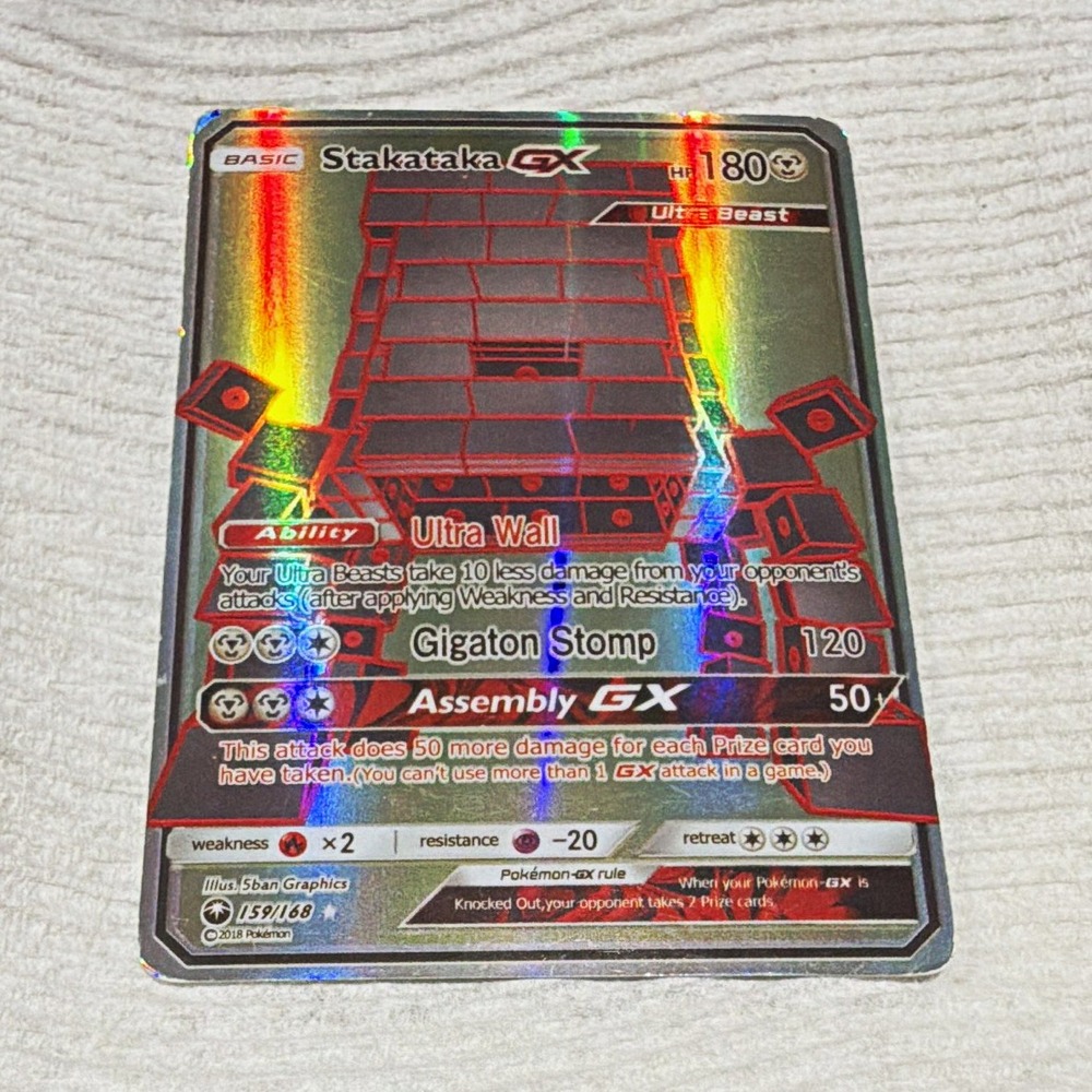 Stakataka GX 159/168 SM Celestial Storm Holo Ultra Rare GX English 2018